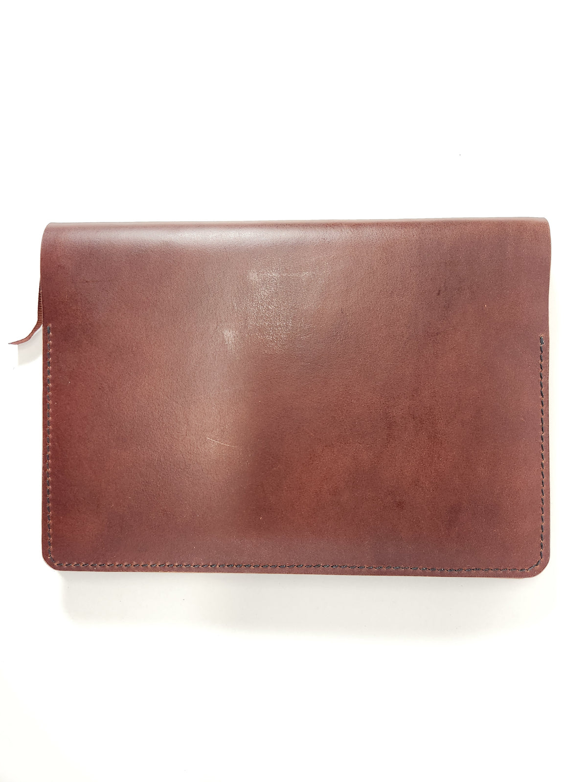 Handcrafted mahogany leather journal cover with hand saddle stitching